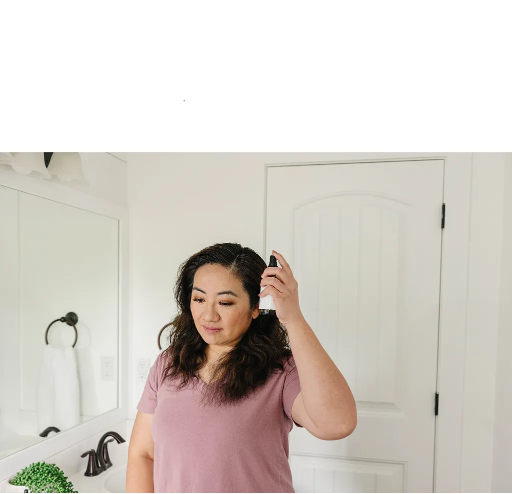 hair growth spray in hair.webp
